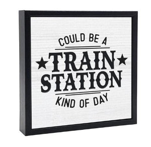 Could be  train station kind of day - sign